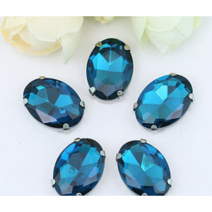 Овал в цапах Blue Zircon